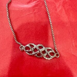 Elegant Silver Knot Necklace
